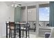 Dining area with table, chairs, and balcony access with scenic views at 200 76Th Ave. N # 510, Myrtle Beach, SC 29572