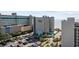 The building features an ocean view, a pool, and easy beach access, enhanced by lush palm trees at 200 76Th Ave. N # 510, Myrtle Beach, SC 29572