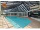 Beautiful indoor swimming pool featuring a glass roof and plenty of room for relaxation at 200 76Th Ave. N # 510, Myrtle Beach, SC 29572