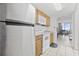Functional kitchen includes wood cabinets, white appliances, and a convenient layout at 200 76Th Ave. N # 510, Myrtle Beach, SC 29572