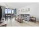 Inviting living room featuring a comfortable sofa, modern furniture, and a dining area at 200 76Th Ave. N # 510, Myrtle Beach, SC 29572