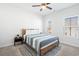 Airy bedroom featuring natural light, a stylish rug, and a comfortable bed at 2557 Pete Dye Dr. # 403, North Myrtle Beach, SC 29582