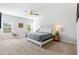 A bright bedroom with large bed and modern decor at 2557 Pete Dye Dr. # 403, North Myrtle Beach, SC 29582