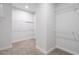 Walk-in closet with wire shelving and neutral carpet at 2557 Pete Dye Dr. # 403, North Myrtle Beach, SC 29582