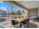 Cozy outdoor patio with pond view and seating at 2557 Pete Dye Dr. # 403, North Myrtle Beach, SC 29582