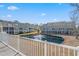 Community pond with fountain and surrounding townhomes at 2557 Pete Dye Dr. # 403, North Myrtle Beach, SC 29582