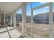 Screened porch with a view of the pond and surrounding buildings at 2557 Pete Dye Dr. # 403, North Myrtle Beach, SC 29582