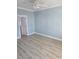 Clean bedroom with updated vinyl flooring, fresh paint and a ceiling fan ready for its new owner at 328 46Th Ave. N, North Myrtle Beach, SC 29582