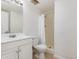 A standard white bathroom with a white shower-tub combo, toilet, and vanity at 3555 Highway 544 # 17F, Conway, SC 29526