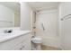 A standard white bathroom with a white shower-tub combo, toilet, and vanity at 3555 Highway 544 # 17F, Conway, SC 29526