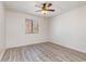 Cozy bedroom with vinyl plank flooring and a window offering ample natural light at 3555 Highway 544 # 17F, Conway, SC 29526