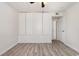 A simple room with gray wood laminate flooring and white walls at 3555 Highway 544 # 17F, Conway, SC 29526