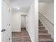 Hallway featuring wood flooring, a staircase, and access to other rooms at 4044 Highway 905, Conway, SC 29526