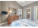Bedroom boasts a comfortable bed and a dresser for plenty of storage space at 4179 Hibiscus Dr. # 303, Little River, SC 29566