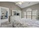 Bright bedroom features a vaulted ceiling, large window, and coastal-themed decor at 4179 Hibiscus Dr. # 303, Little River, SC 29566