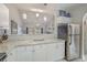 An open kitchen features white cabinetry, granite countertops, stainless steel appliances, and an eat-in bar at 4179 Hibiscus Dr. # 303, Little River, SC 29566