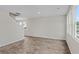 Bright living space with hardwood floors and large windows at 455 Falling Leaf Loop, Myrtle Beach, SC 29588