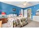 Bright bedroom with colorful quilt, hardwood floors, and neutral walls at 470 Springlake Dr., Myrtle Beach, SC 29579
