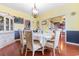 Elegant dining room with wooden floors, a chandelier, and plenty of space for entertaining guests at 470 Springlake Dr., Myrtle Beach, SC 29579