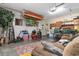 Spacious garage equipped with a TV, organization system, and work area at 470 Springlake Dr., Myrtle Beach, SC 29579