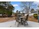 Charming patio with outdoor table and chairs overlooking the picturesque backyard at 470 Springlake Dr., Myrtle Beach, SC 29579