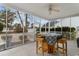 Relaxing screened-in porch area with outdoor furniture and ceiling fan at 470 Springlake Dr., Myrtle Beach, SC 29579
