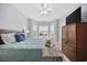 Bedroom with sitting nook, tv and wood furniture at 4865 Luster Leaf Circle # 304, Myrtle Beach, SC 29577