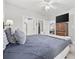 Bedroom featuring TV on top of furniture and entrances to bathroom and walk-in closet at 4865 Luster Leaf Circle # 304, Myrtle Beach, SC 29577