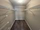 Empty walk-in closet with open shelving, ready for organized storage solutions at 5001 Little River Rd. # E-312, Myrtle Beach, SC 29577