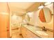 Bathroom with dual sinks, granite countertops, ample cabinet space, and well-lit mirrors at 5507 N Ocean Blvd. # 304, Myrtle Beach, SC 29577