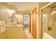 Bathroom featuring a shower, granite countertops, ample lighting, and neutral color palette at 5507 N Ocean Blvd. # 304, Myrtle Beach, SC 29577