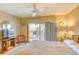 Comfortable bedroom with balcony access, ceiling fan and TV for relaxing at 5507 N Ocean Blvd. # 304, Myrtle Beach, SC 29577