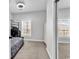 Neutral-toned bedroom with closet and bunkbeds features lots of natural light from the large windows at 5750 Oyster Catcher Dr. # 533, North Myrtle Beach, SC 29582