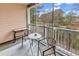 Relaxing screened porch with seating and views of the natural landscape at 5750 Oyster Catcher Dr. # 533, North Myrtle Beach, SC 29582