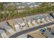 Overhead shot of a neighborhood with well-kept homes, manicured lawns, and tree-lined streets at 5987 Tramonto St., Myrtle Beach, SC 29577