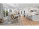 Open concept dining room and living area features wood floors and modern decor at 5987 Tramonto St., Myrtle Beach, SC 29577