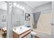 This bathroom features a shower and tub, a toilet, and a sink with plenty of counter space at 6001- 1084 S Kings Highway, Myrtle Beach, SC 29575