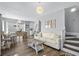 Inviting living room features hardwood floors, comfortable seating, and stylish decor, creating a cozy atmosphere at 6001- 1084 S Kings Highway, Myrtle Beach, SC 29575
