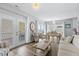 Charming living area with seamless access to the outdoor deck, creating an ideal flow for entertaining and relaxation at 6001- 1084 S Kings Highway, Myrtle Beach, SC 29575