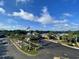 Scenic street view of a commercial area with palm trees, an American flag, and a restaurant with ample parking at 6001- 1084 S Kings Highway, Myrtle Beach, SC 29575