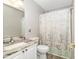 The bathroom features a vanity with a marbled countertop, and a themed shower curtain at 6001-1383 S Kings Hwy., Myrtle Beach, SC 29575