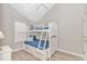 This bedroom has a bunkbed with built in storage and natural light at 6001-1383 S Kings Hwy., Myrtle Beach, SC 29575