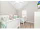 Bright bedroom features vaulted ceilings, two beds, and coastal-themed bedding at 6001-1383 S Kings Hwy., Myrtle Beach, SC 29575
