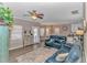 Open-concept living room with comfortable seating, modern decor, and a view of the kitchen and dining area at 6001-1383 S Kings Hwy., Myrtle Beach, SC 29575