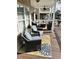 Inviting porch with comfortable seating, a ceiling fan, and stylish decor, perfect for relaxing outdoors at 6001-1383 S Kings Hwy., Myrtle Beach, SC 29575
