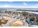Stunning aerial view of a coastal community along the Intracoastal Waterway near Ocean Isle Beach at 6514 Anchors Bend Dr Sw, Ocean Isle Beach, NC 28469