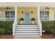 Charming front porch with a pop of color, a relaxing outdoor space at 6514 Anchors Bend Dr Sw, Ocean Isle Beach, NC 28469