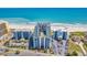 Aerial view of multiple beachfront resorts featuring parking and ocean views at 6804 N Ocean Blvd. # 1623, Myrtle Beach, SC 29572