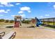 Exterior view of a playground with a slide and swing sets at 6804 N Ocean Blvd. # 1623, Myrtle Beach, SC 29572
