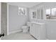 Well-lit bathroom featuring a modern vanity, sleek fixtures, and elegant marble tile flooring at 708 Bobby L. Davis Blvd., Marion, SC 29571